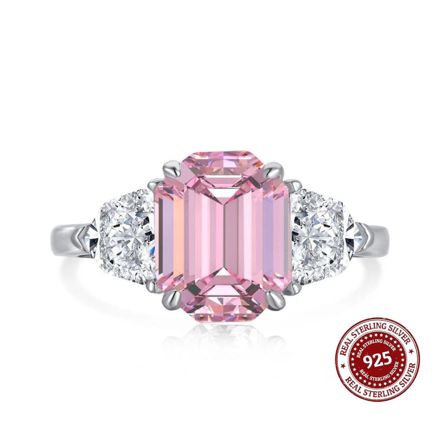 Ring with pink gemstone and diamond accents on a white background, featuring a 'Real Sterling Silver 925' stamp.