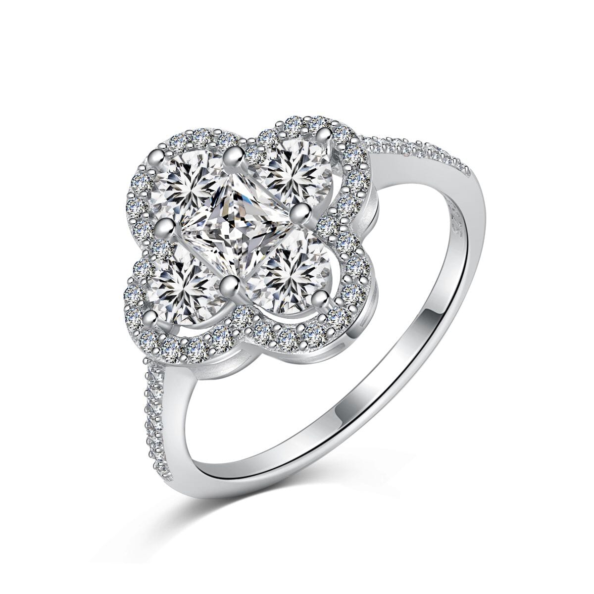 Silver clover-shaped ring with diamonds.