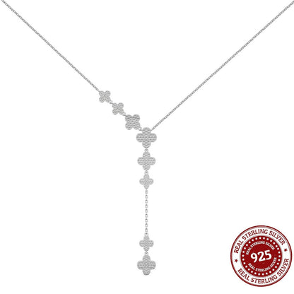 Silver necklace with a pendant on a white background, featuring a 'Real Sterling Silver 925' stamp.
