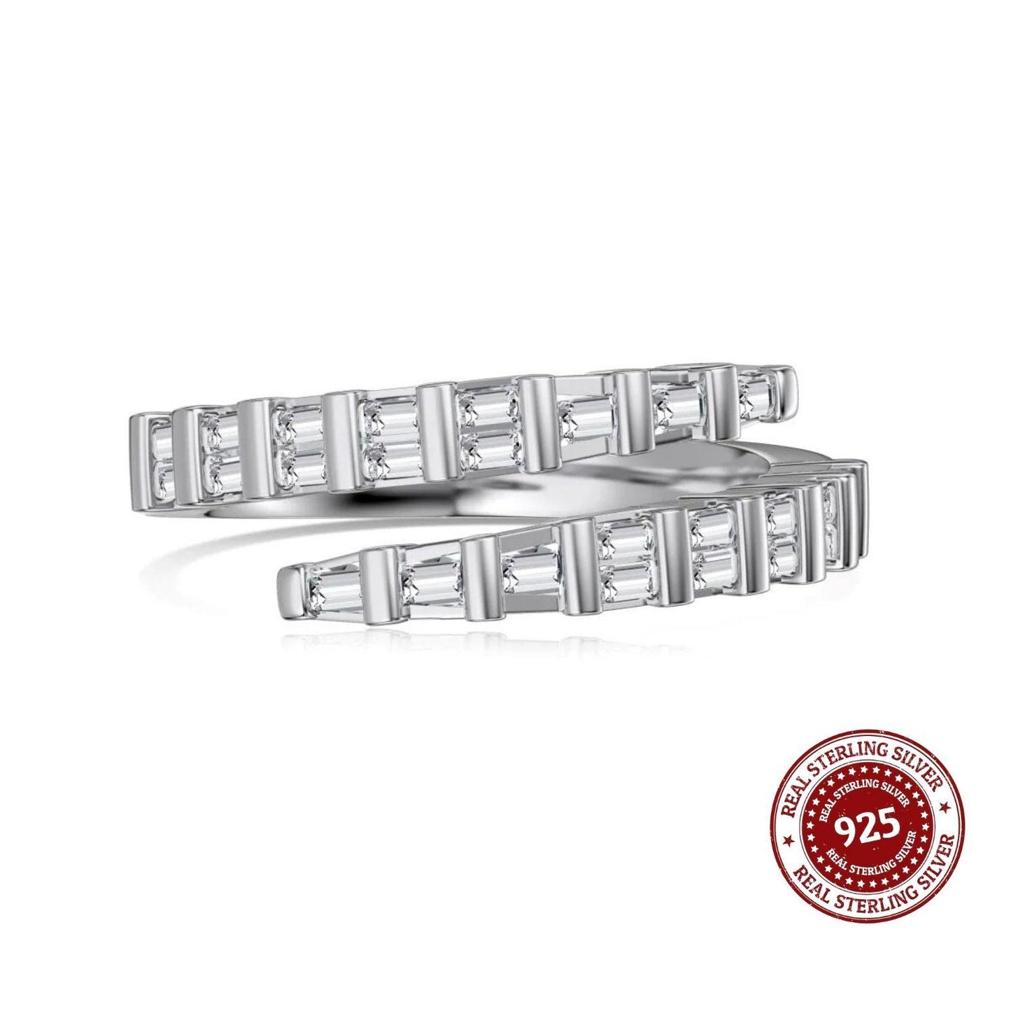 Silver ring with baguette-cut gemstones and 'Real Sterling Silver 925' stamp on a white background