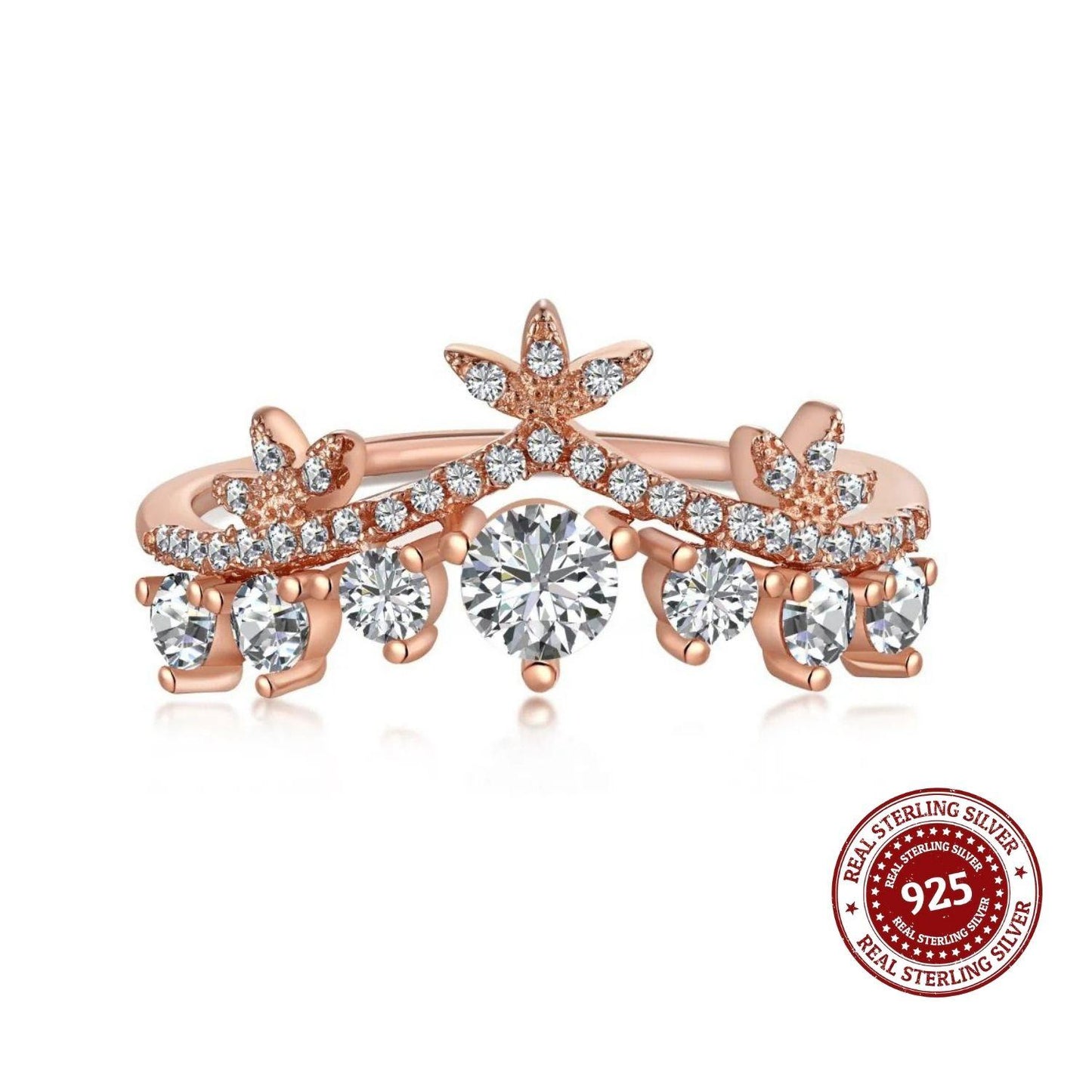 Rose gold ring with diamonds on a white background, featuring a 'Real Sterling Silver 925' stamp.