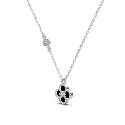 Silver chain necklace with clover pendant.
